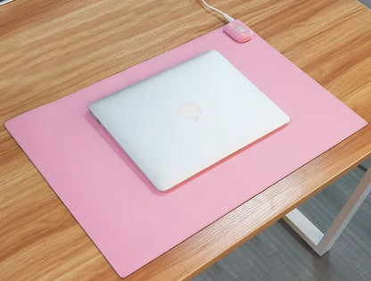 Two-stage Heating Desk Pad in black or pink, featuring quick warmth and waterproof design