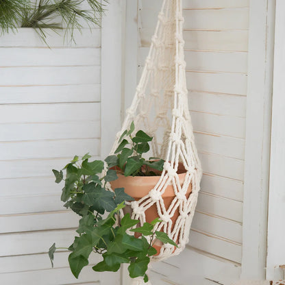 Hand-woven Scandinavian spider plant net bag measuring 30cm by 20cm with rectangular shape and natural fibre construction