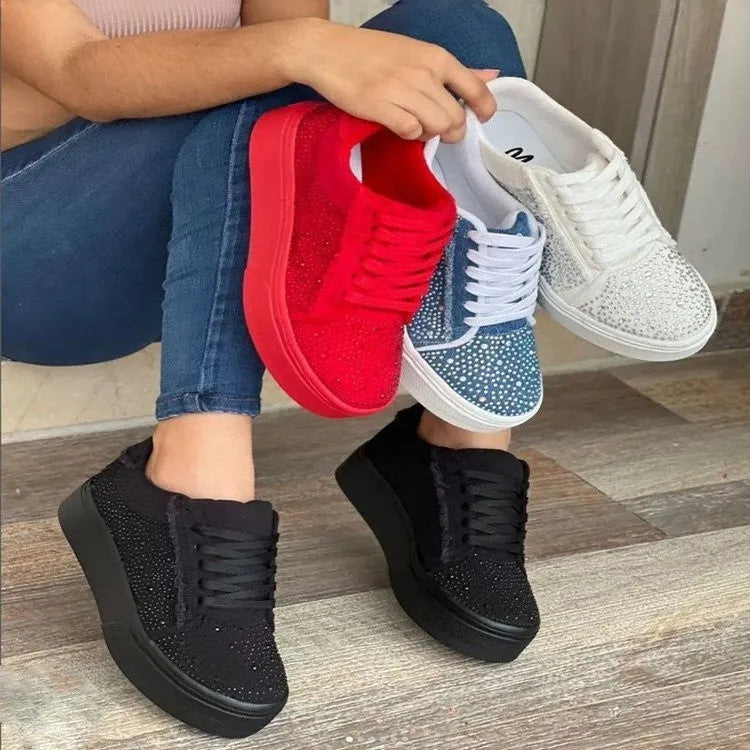 Plus size women's black lace-up casual shoes with rhinestone detail on round toe and thick rubber sole.