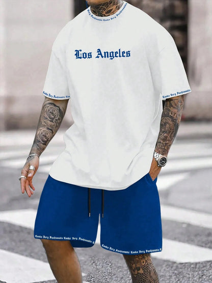 Man wearing a grey short-sleeve sports top and matching shorts from the quick-dry polyester set.
