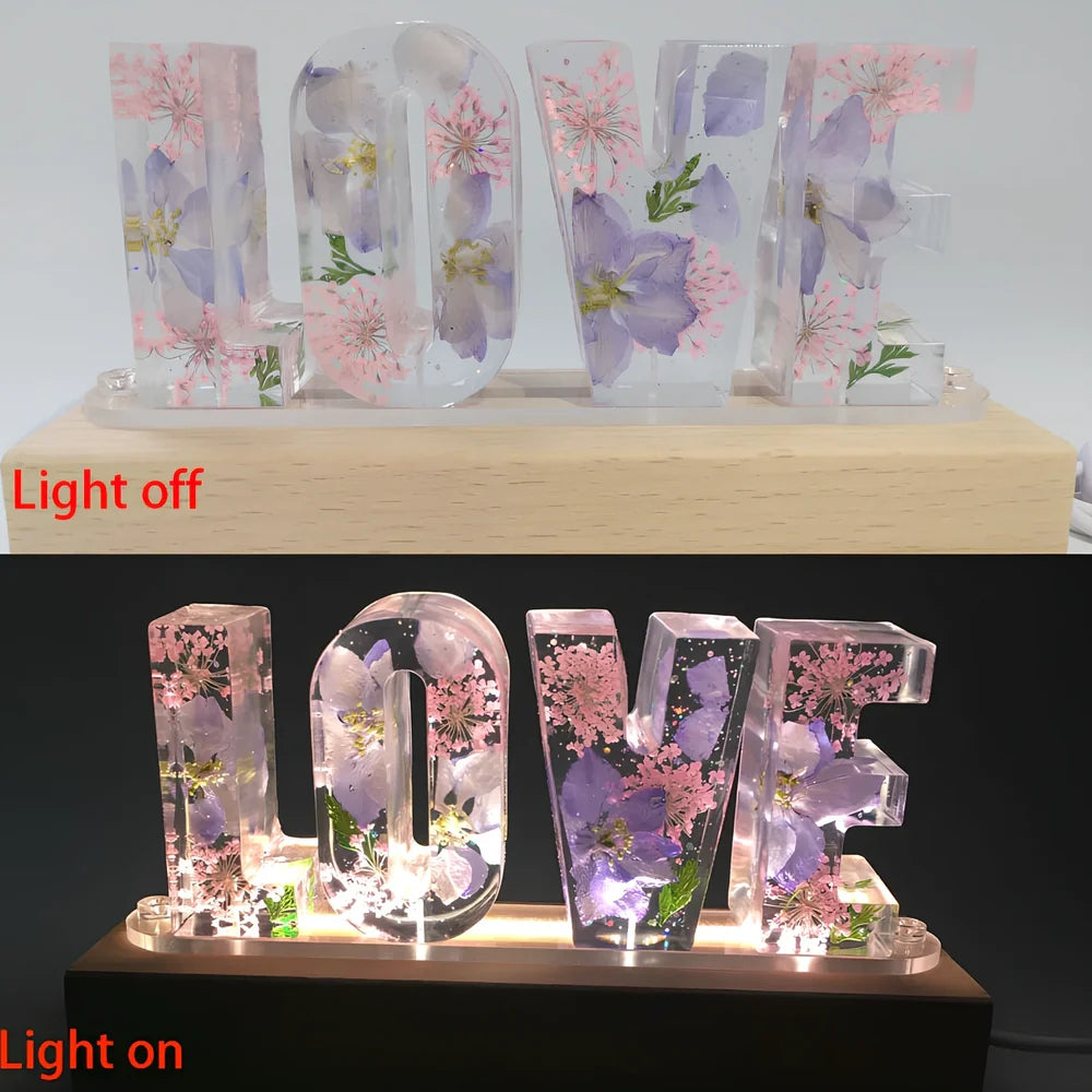 Wooden LOVE letter table lamp with dried flowers and warm LED light for bedroom use