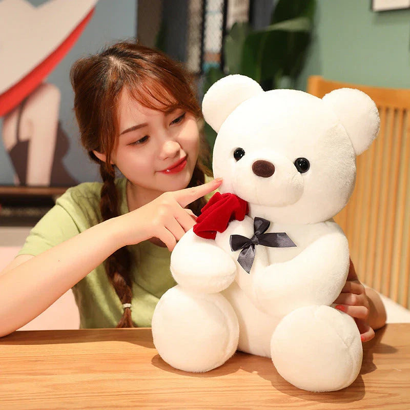 Soft, plush teddy bear-shaped pillow in brown, beige, and grey colors, perfect for cuddling and relaxation
