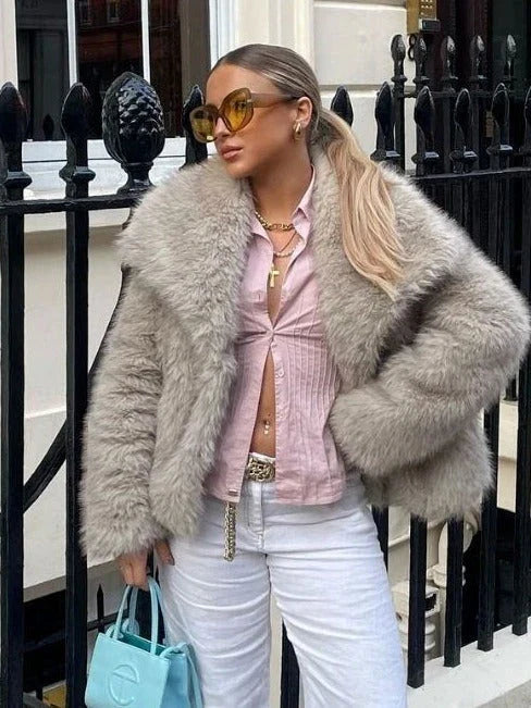 A warm and stylish plush coat for women, available in a variety of colors and sizes.