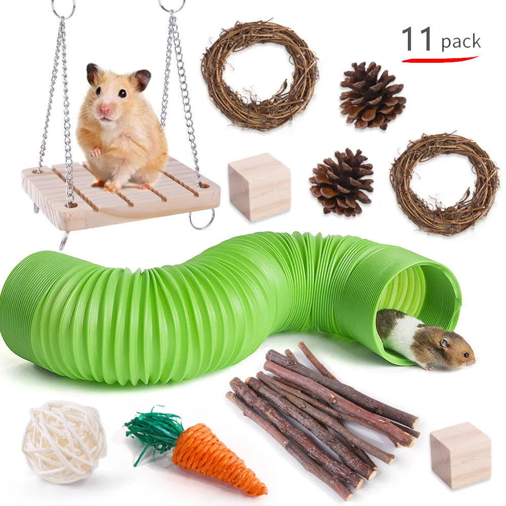 Assortment of wooden and natural fibre chew toys for small pets including balls, rings and woven shapes.