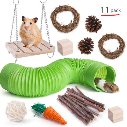 Assortment of wooden and natural fibre chew toys for small pets including balls, rings and woven shapes.