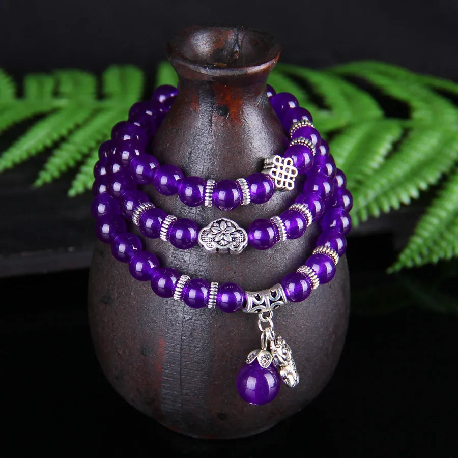 Purple chalcedony natural crystal bracelet with three-circle ethnic design on elastic cord
