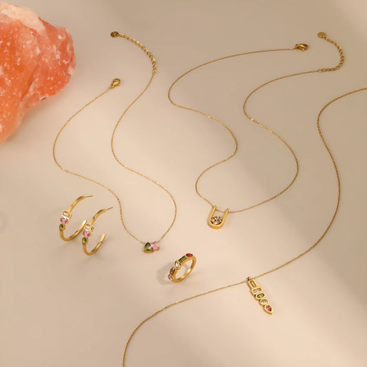 Geometric zircon jewellery set with gold-plated necklace, ring and earrings on stainless steel chain