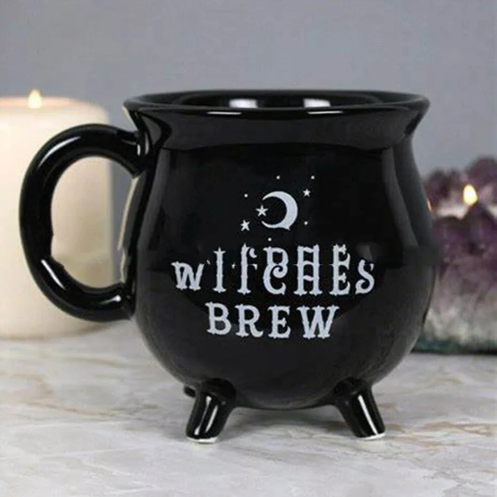Black ceramic witch coffee mug with cartoon design showing 350ml capacity