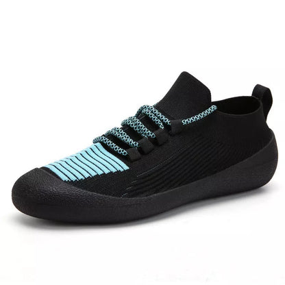 Men's casual lace-up sneakers in solid colors with round toe and rubber sole