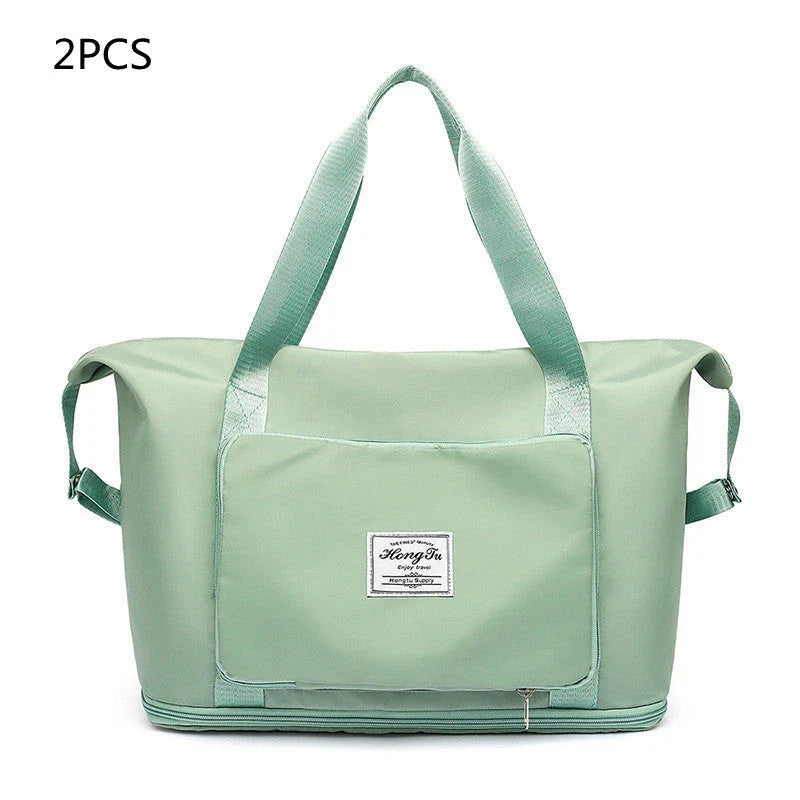 Roomy and foldable gym bag for women with waterproof Oxford fabric, multiple pockets, and wet/dry separation compartment