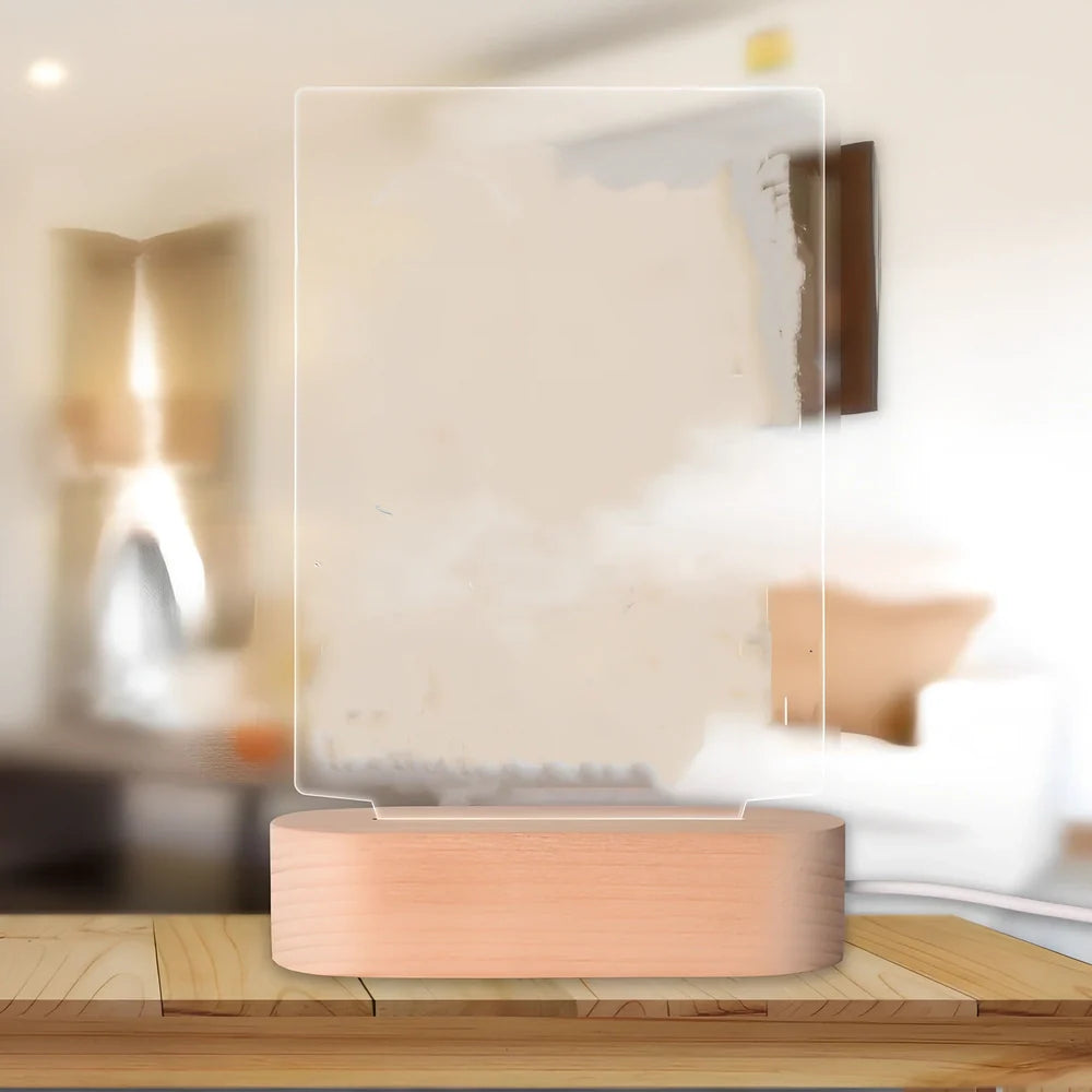 Customisable photo night light with 22x15cm acrylic panel showing engraved song lyrics beside personal photograph