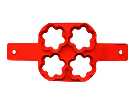 Red silicone egg mould measuring 3x3x6 inches for creating shaped hard-boiled eggs without shells