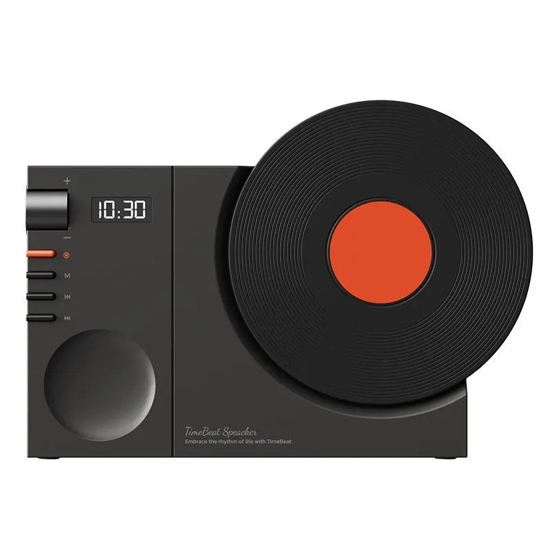 Mini Bluetooth speaker in obsidian black, showing compact design and USB port for charging.