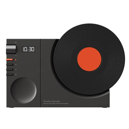 Mini Bluetooth speaker in obsidian black, showing compact design and USB port for charging.