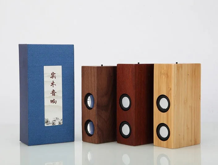 Retro-style wooden Bluetooth speaker in a choice of bamboo, black walnut, or sapele wood finishes.