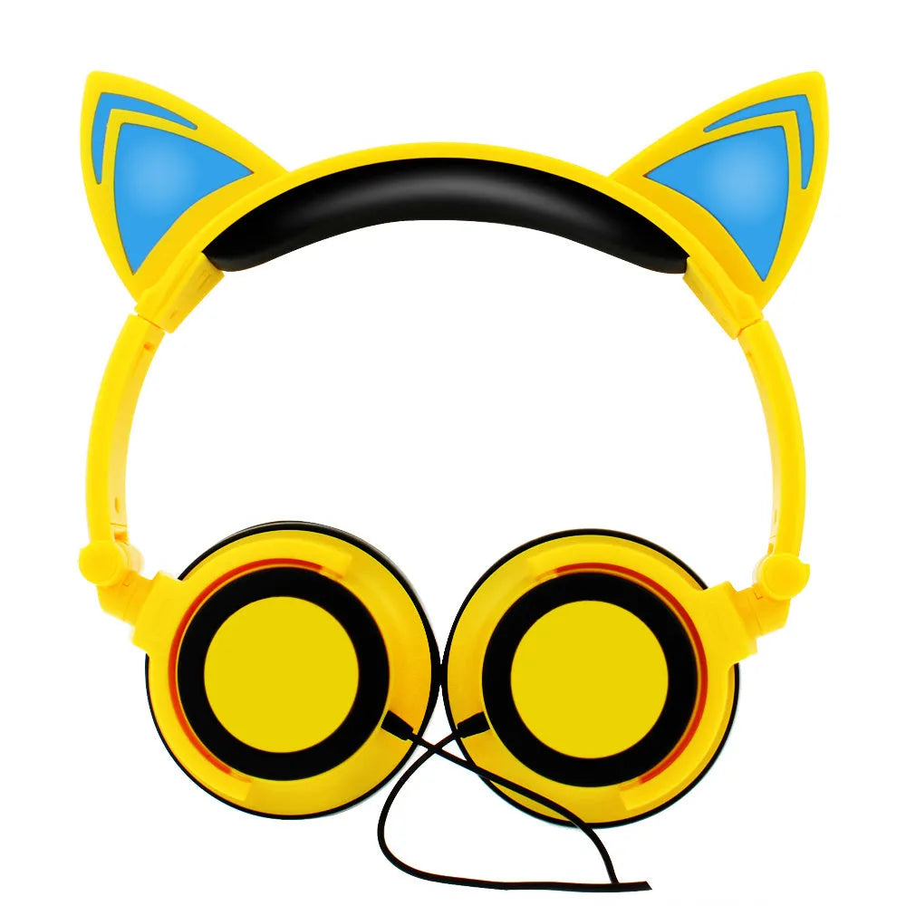 Colourful LED cat ear headphones with illuminated ears and cushions on a black background