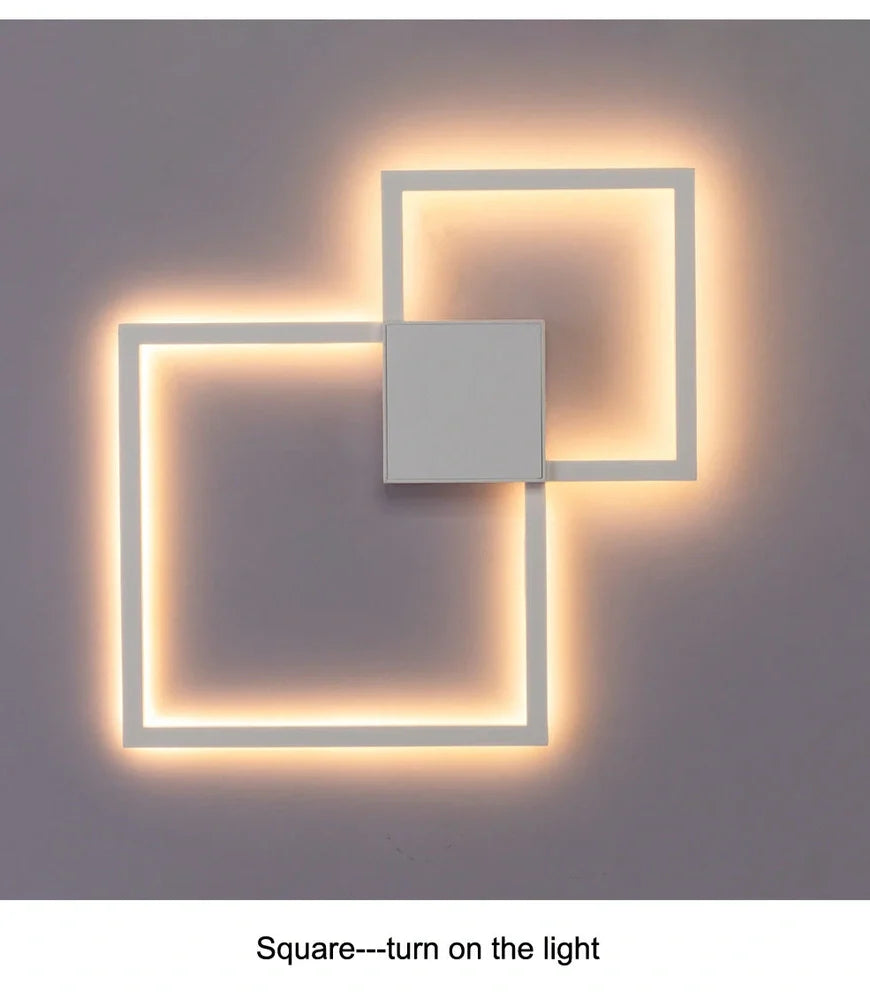 Square 35.3cm geometric LED wall light in white, iron frame with acrylic diffuser, 20W-24W output