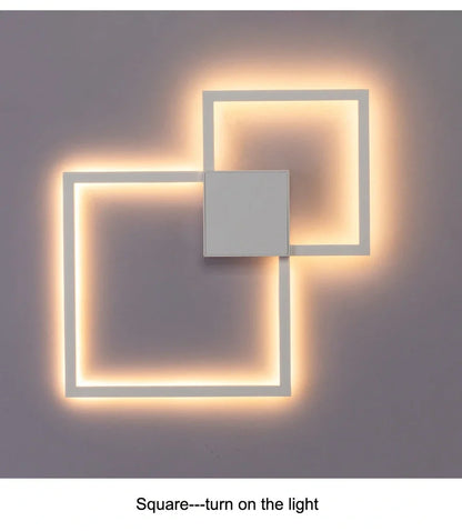 Square 35.3cm geometric LED wall light in white, iron frame with acrylic diffuser, 20W-24W output
