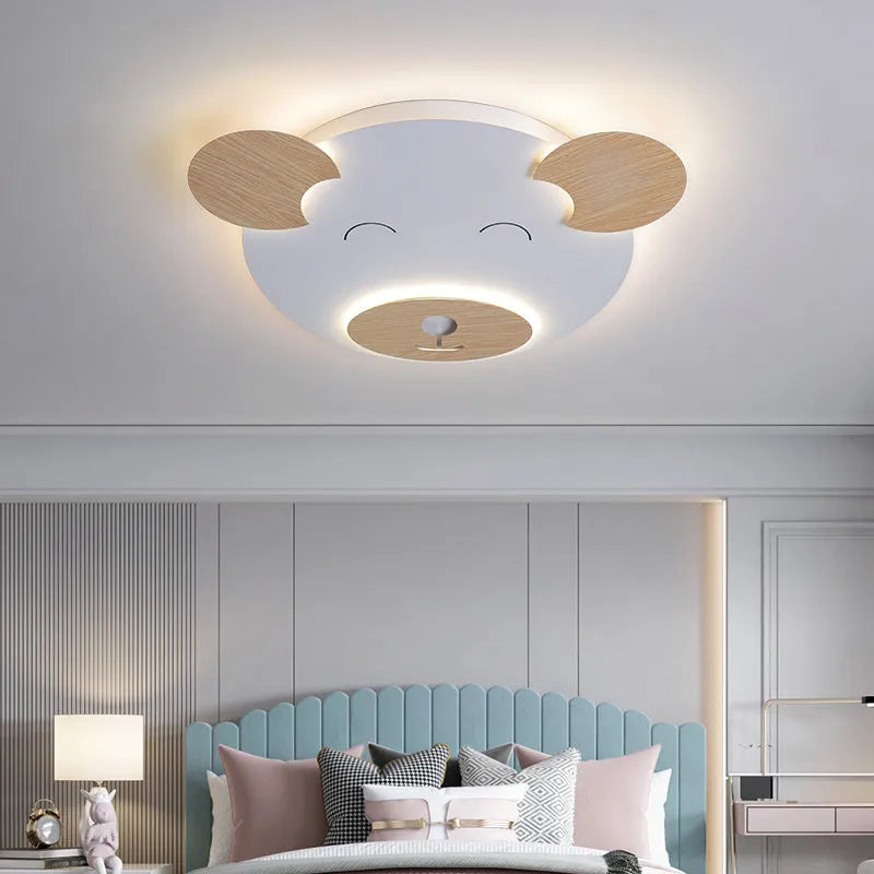 Cartoon bear shaped ceiling lamp with wrought iron frame for a princess themed room.