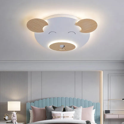 Cartoon bear shaped ceiling lamp with wrought iron frame for a princess themed room.