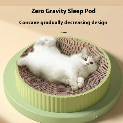 Green round cat scratching board measuring 55cm with corrugated paper surface and two replacement inserts