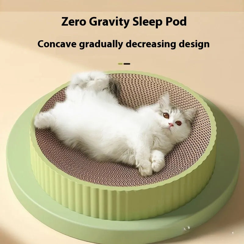 Round green cat scratching board measuring 55cm with corrugated paper surface and two replacement refills