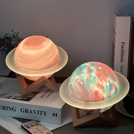 Rings of Saturn Dream Bluetooth Speaker showing 16.5cm dimensions with remote control and bracket accessories