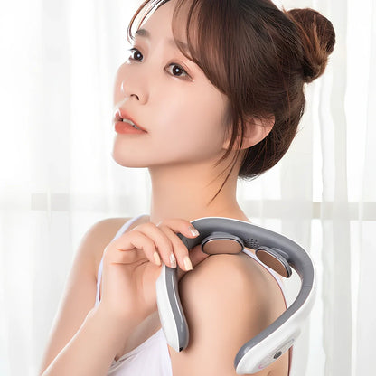 White folding electric pulse shoulder massager showing compact 19cm by 12.5cm by 6cm size with USB charging port