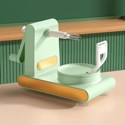 Hand-cranked ABS plastic peeler machine with suction cup base in light green colour