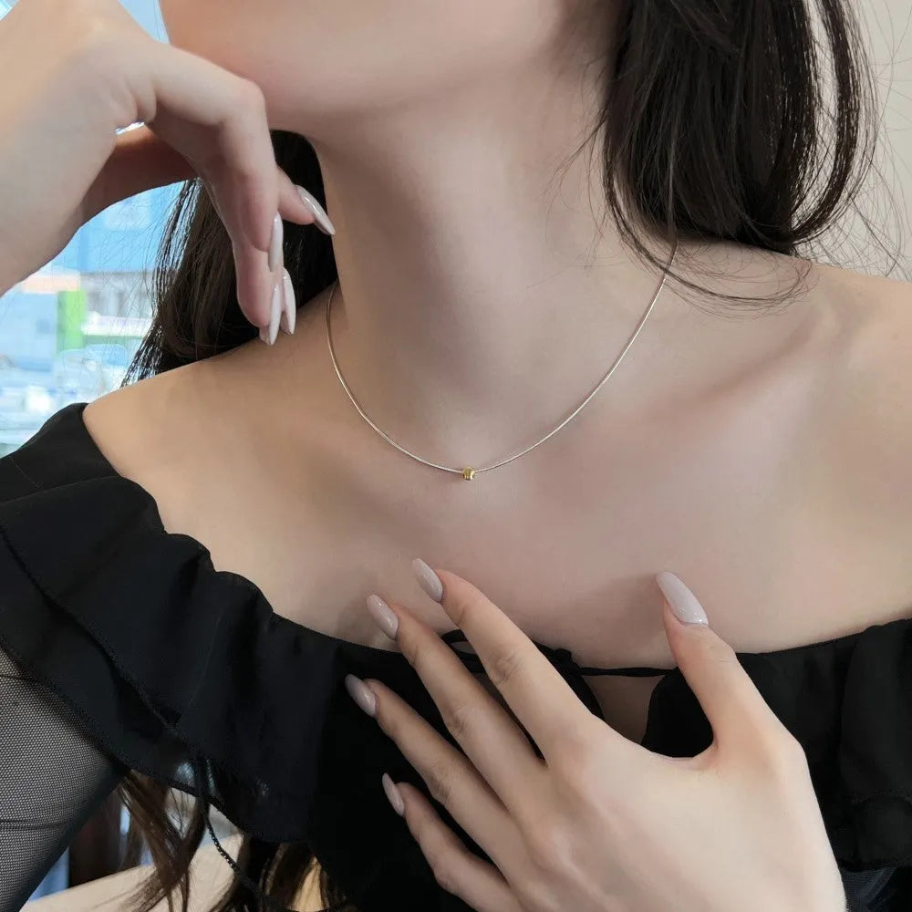 S925 sterling silver necklace for women with geometric pendant and golden balls design on a regular chain