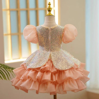 Girls' orange sequin princess dress with puff sleeves, shown in seven height options from 100cm to 160cm