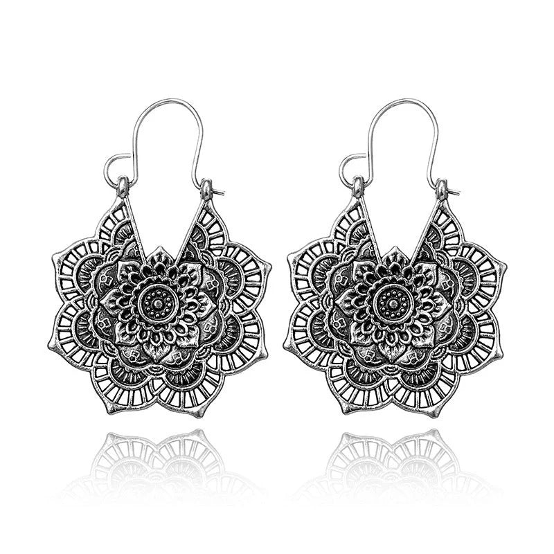 Vintage floral openwork metal earrings showcasing ethnic style and elegance