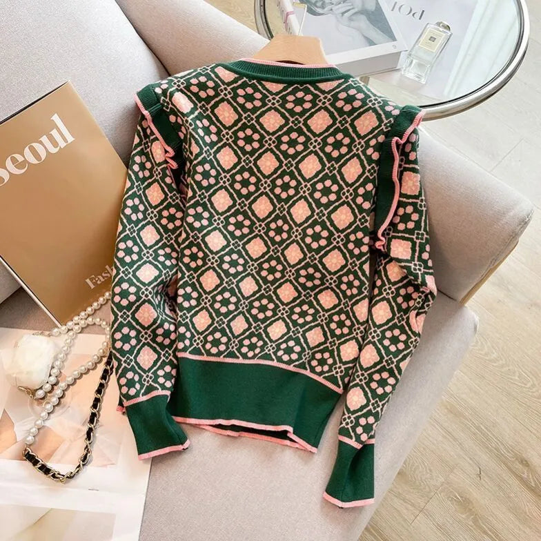 Green printed loose fit women's sweater with regular sleeves, free size.