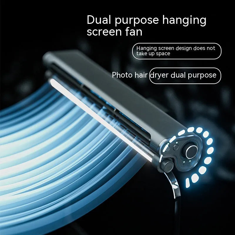Black bladeless USB fan with lighting lamp clamped to laptop screen showing 32.5cm width