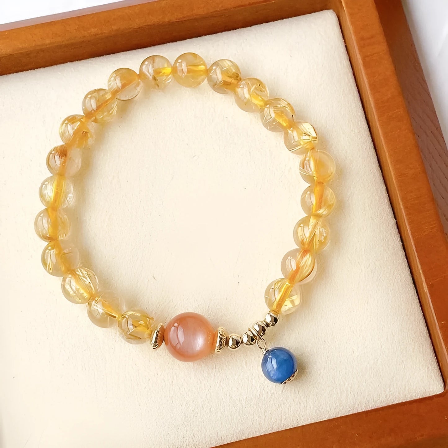 Gold rutilated quartz sunstone bracelet with round diamond shape and adjustable 20-24cm sizing