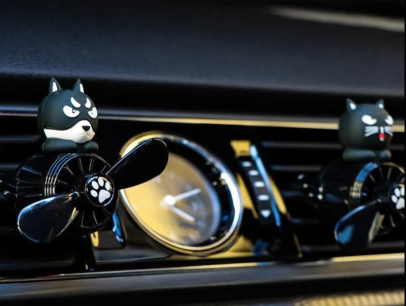 Set of four animal-themed car air vent clip ornaments: black husky, black cat, pink cat, and pink duck.