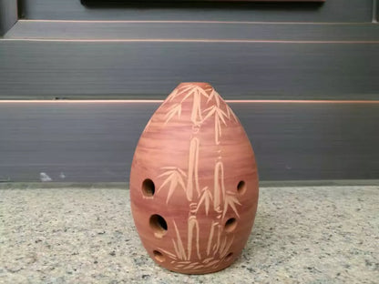 Seven Star Ancient Xun Musical Instrument with eight holes and pear shape in various colors