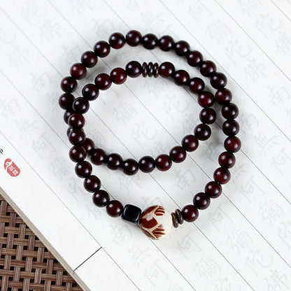 Natural rosewood double-ring bracelet with hand-knitted construction and retro floral design
