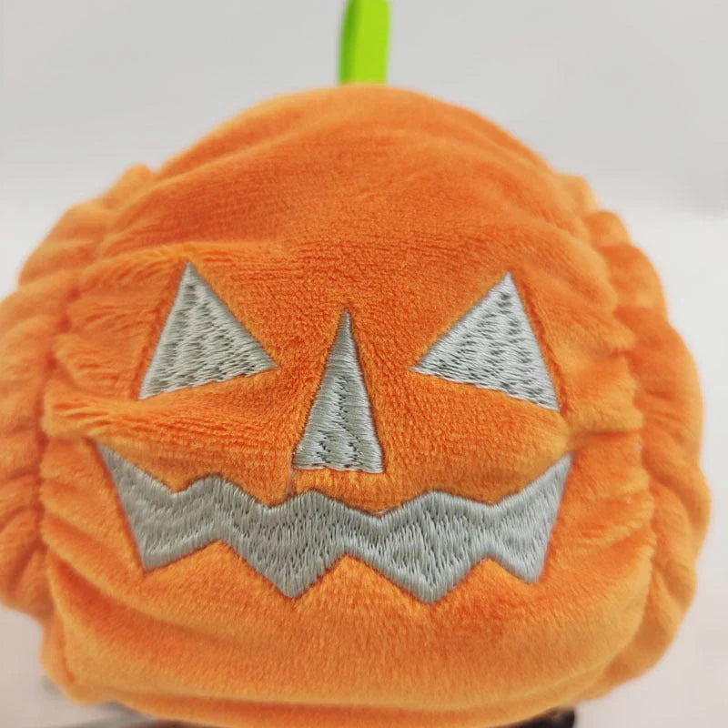 Reversible Halloween plush toys with glow-in-the-dark ghost and pumpkin designs that can switch between happy and angry moods