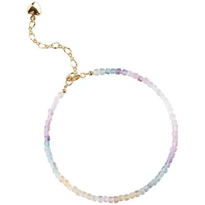 Women's handmade bracelet with rainbow fluorite stones in copper geometric quadrilateral settings