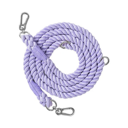 Woven rainbow pattern dog leash with double grip handles and a metal clasp.