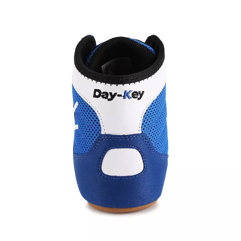 Mesh wrestling boxing shoes in red and blue, ideal for indoor training and competition