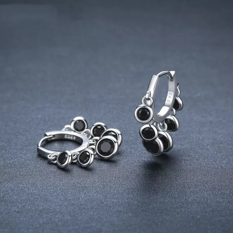 Copper inlaid round zircon earrings with black tassel design