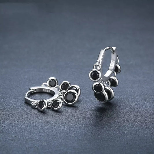 Copper inlaid round zircon earrings with black tassel design