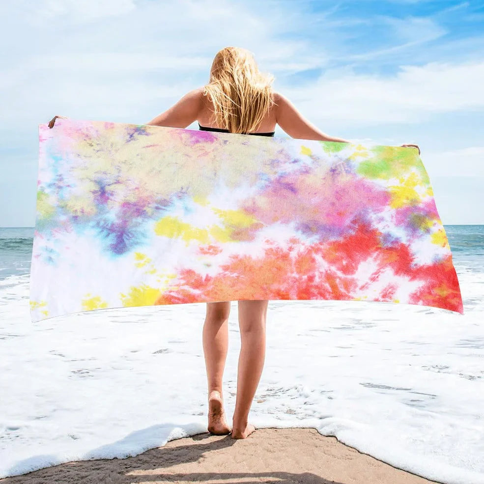 Square beach towel with tie-dye pattern showing superfine fibre texture and vibrant colours