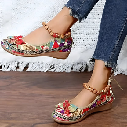 Women's black plus size ethnic style platform sandals with elastic band and cloth upper.