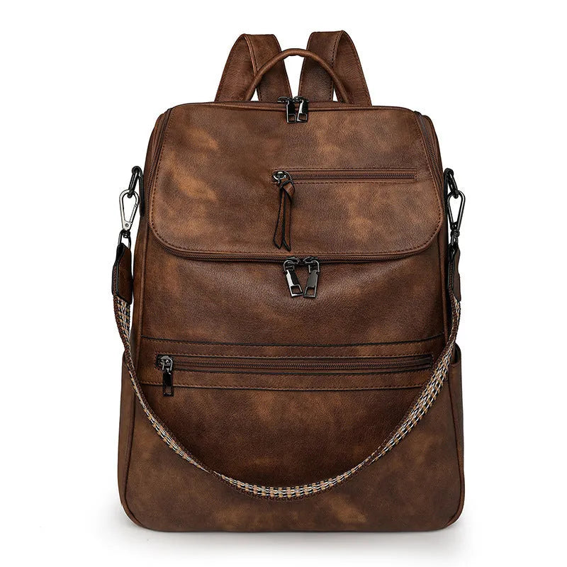 Retro college student backpack with curved shoulder straps in multiple colour options including black, blue, and yellow apricot
