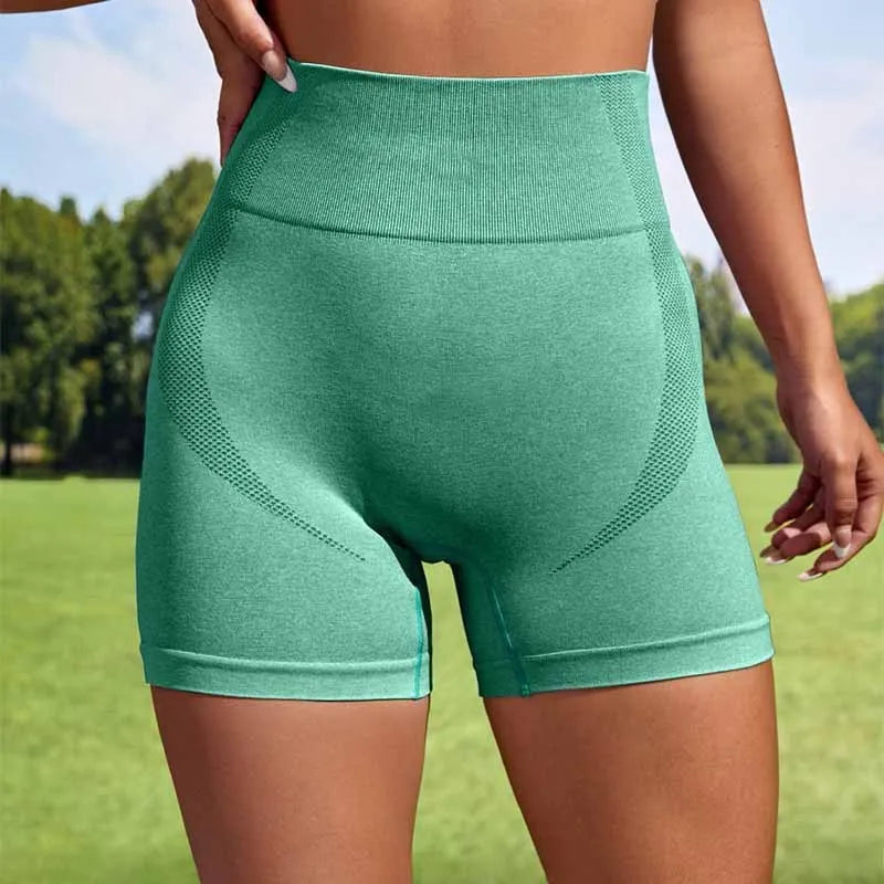 Women's seamless short leggings in Army Green with high waist elastic band, ideal for yoga and gym workouts