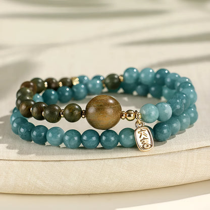 Natural stone blue women's beaded bracelet with geometric shapes and Chinese Fu and Xi characters.