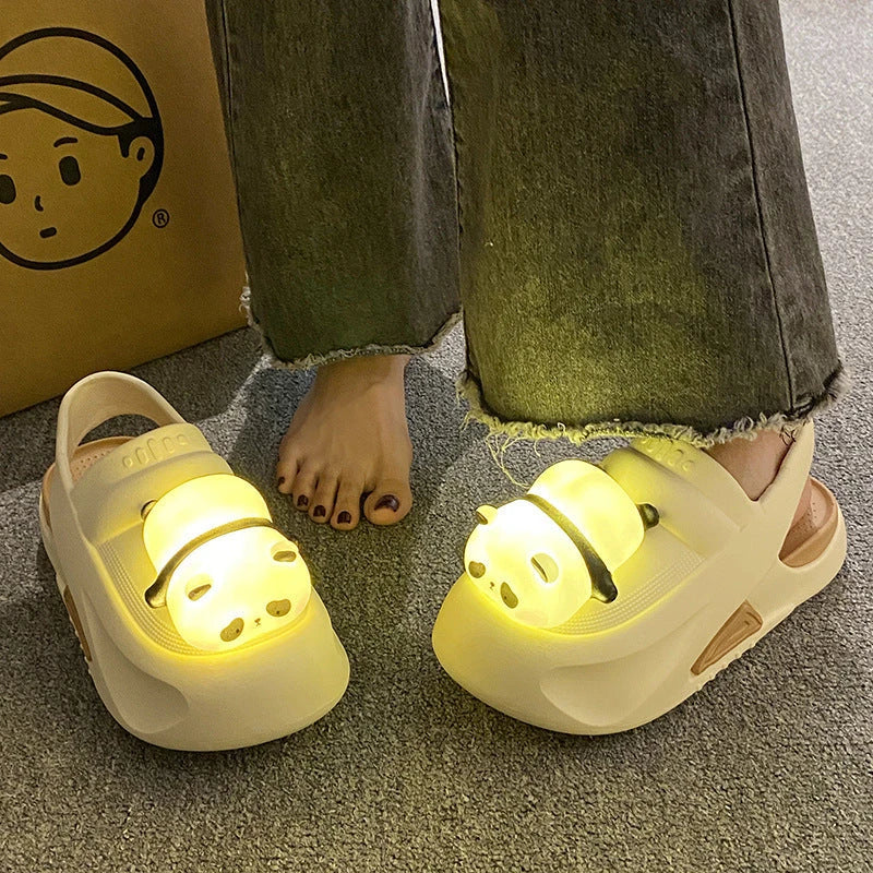 Cozy Panda Night Light Slippers with a charming panda design, built-in night light, and comfortable EVA construction